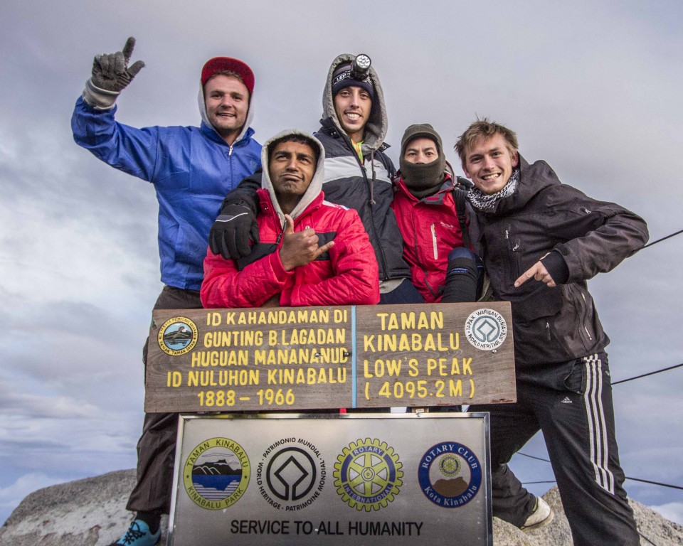 Group photo at the summit after climbing kinabalu